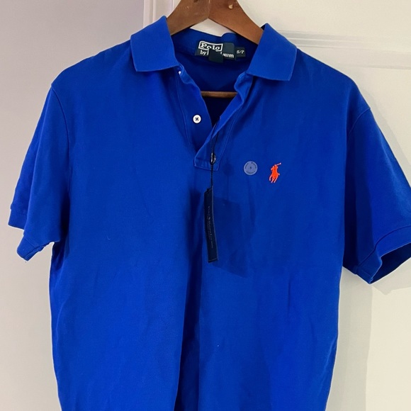 NWT Polo shirt. Blue never worn. - Picture 1 of 2